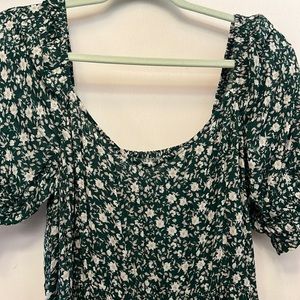 Bought and worn once.  Green and white floral.  Stretchy back.